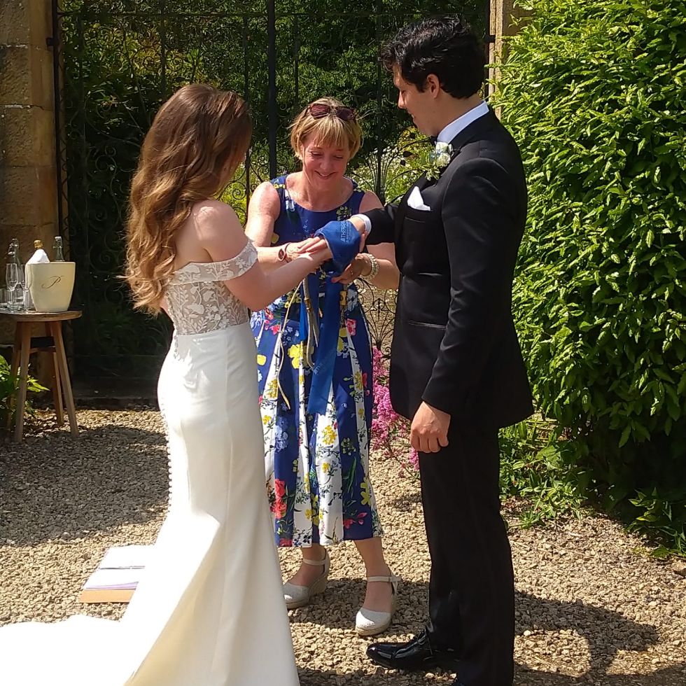 Couple tie knot with celebrant at Yorkshire elopement ceremony